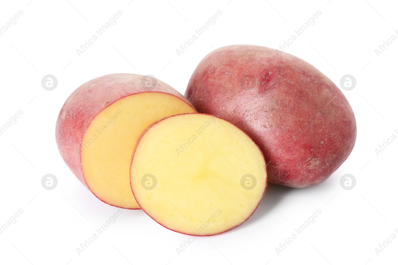 Photo of Whole and cut fresh ripe red potatoes isolated on white