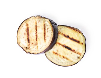 Photo of Grilled slices of eggplant isolated on white, top view