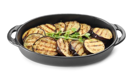 Photo of Grilled slices of eggplant with microgreens isolated on white