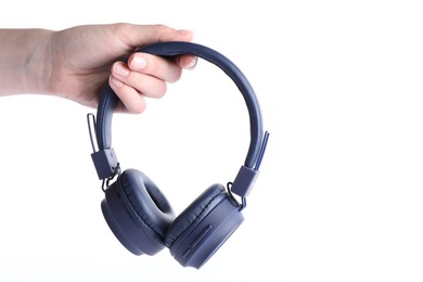 Photo of Woman with stylish blue headphones on white background, closeup