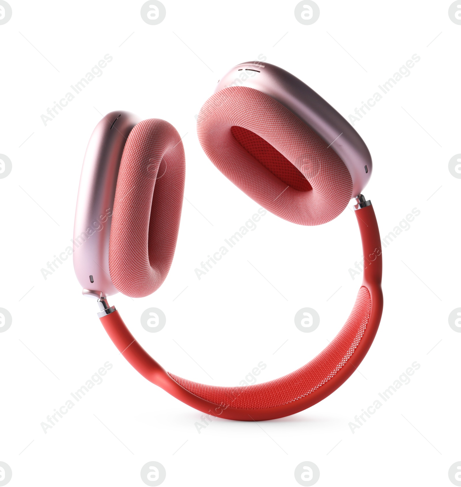 Pair of stylish pink headphones isolated on white Photo of Pair of stylish pink headphones isolated on white