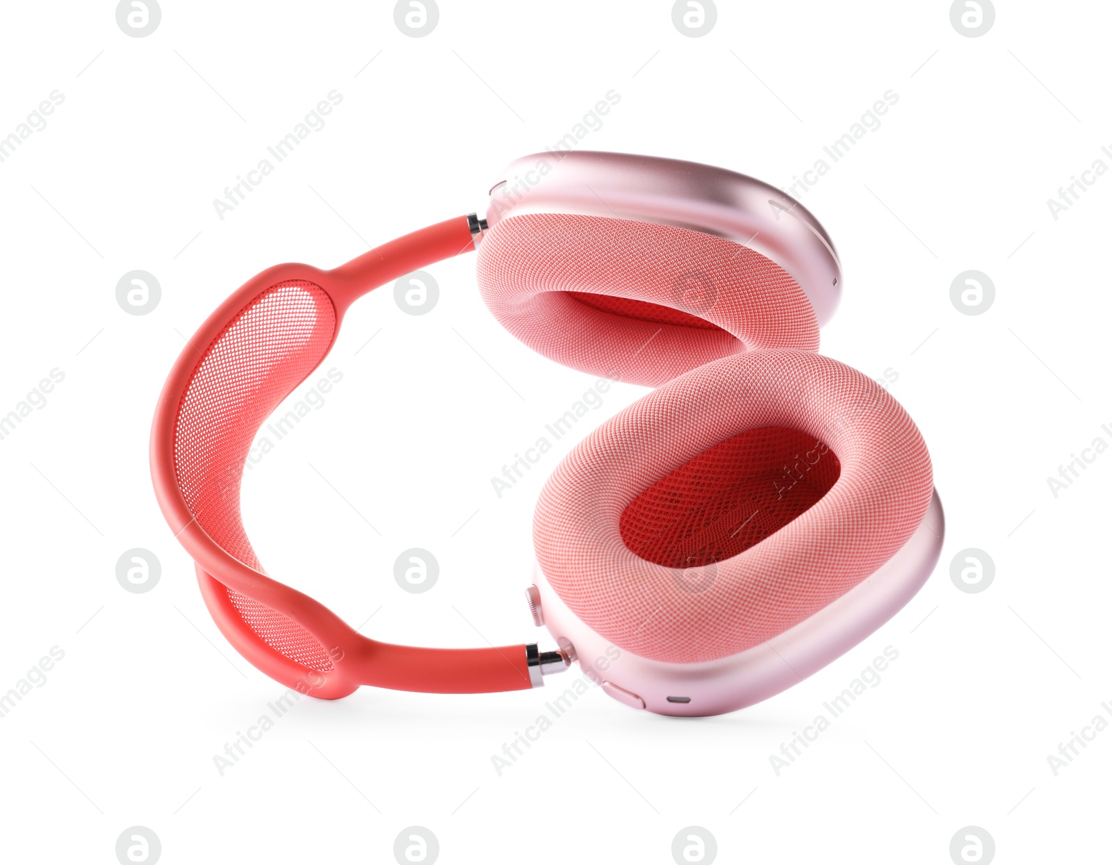 Photo of Pair of stylish pink headphones isolated on white