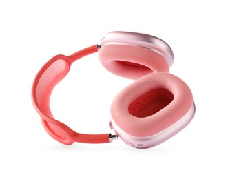 Photo of Pair of stylish pink headphones isolated on white