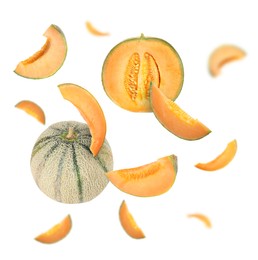 Image of Tasty ripe Cantaloupe melons swirling in air against white background