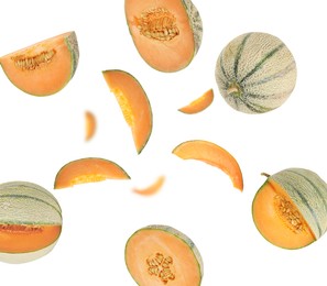 Image of Tasty ripe Cantaloupe melons swirling in air against white background