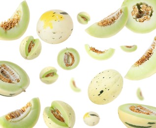 Image of Tasty ripe melons swirling in air against white background