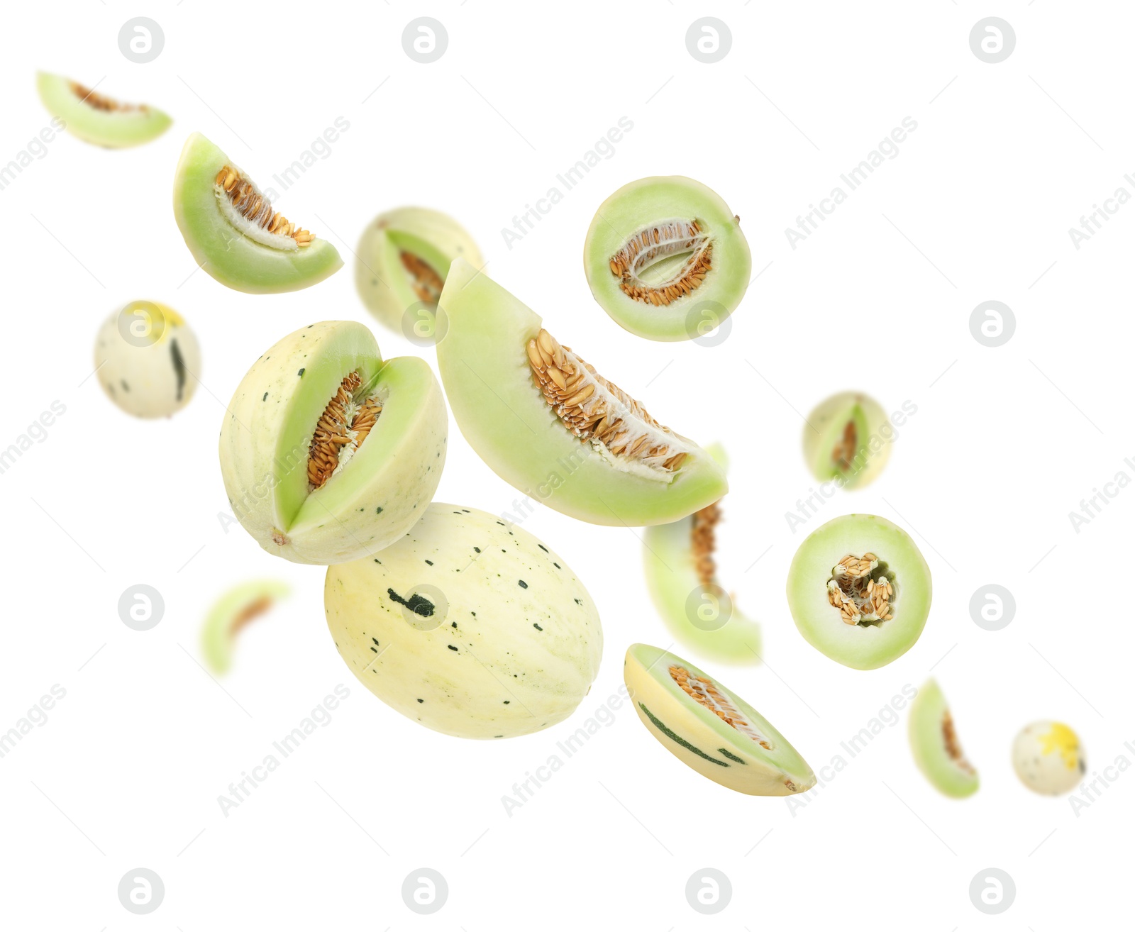 Tasty ripe melons swirling in air against white background Image of Tasty ripe melons swirling in air against white background