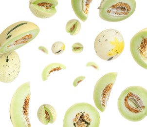 Image of Tasty ripe melons swirling in air against white background