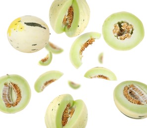 Image of Tasty ripe melons swirling in air against white background