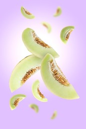 Image of Cut fresh ripe melons swirling in air against violet gradient background