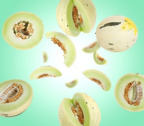 Image of Tasty ripe melons swirling in air against turquoise gradient background