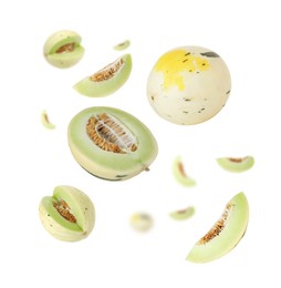 Image of Tasty ripe melons swirling in air against white background