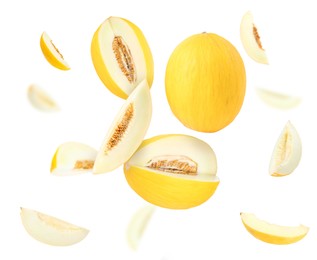 Image of Tasty ripe melons swirling in air against white background