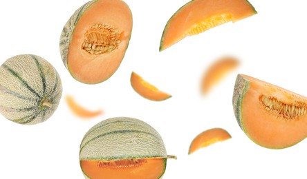 Image of Tasty ripe Cantaloupe melons swirling in air against white background