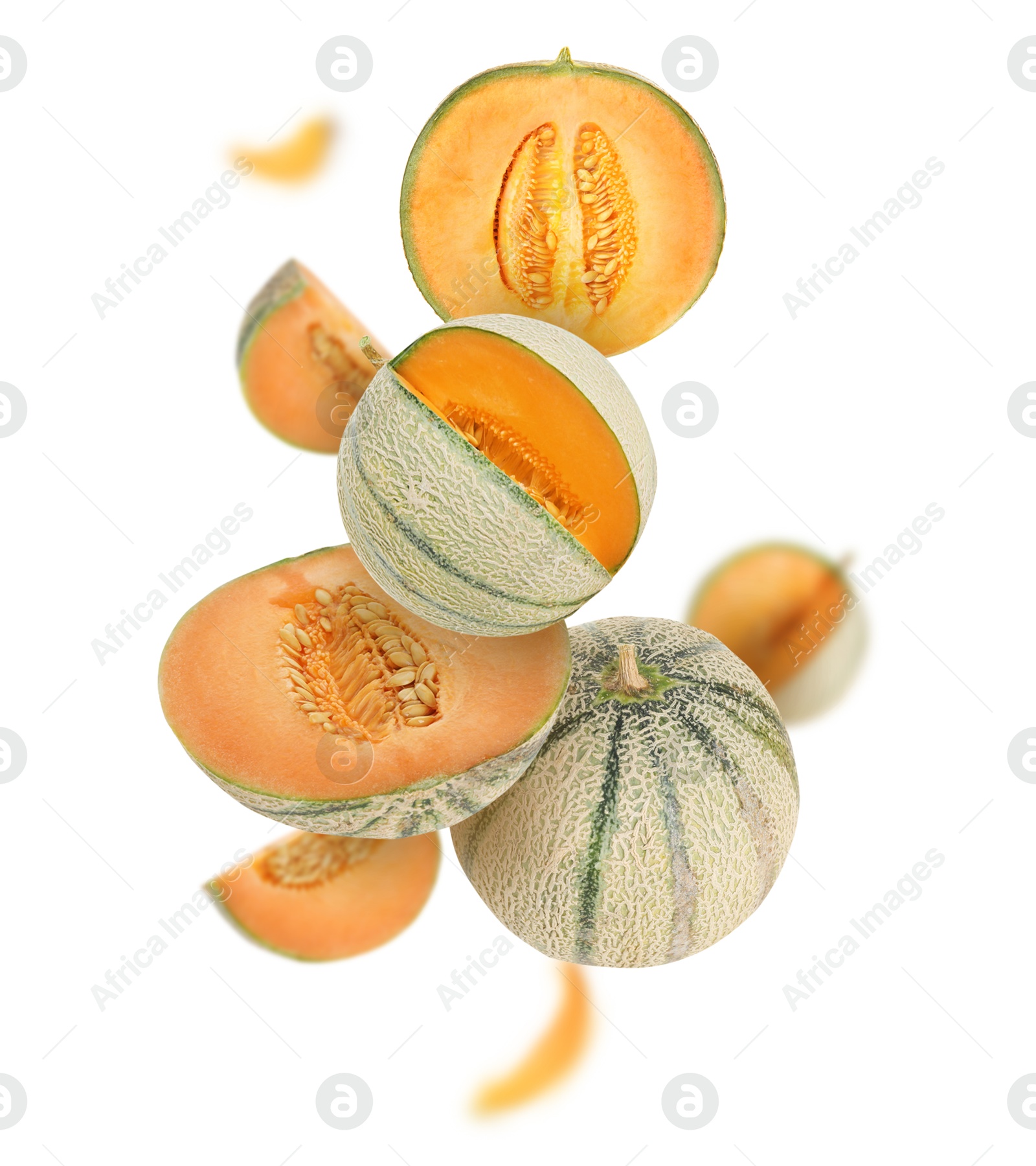 Tasty ripe Cantaloupe melons swirling in air against white background Image of Tasty ripe Cantaloupe melons swirling in air against white background