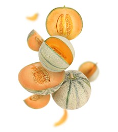 Image of Tasty ripe Cantaloupe melons swirling in air against white background