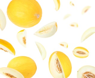 Image of Tasty ripe melons swirling in air against white background