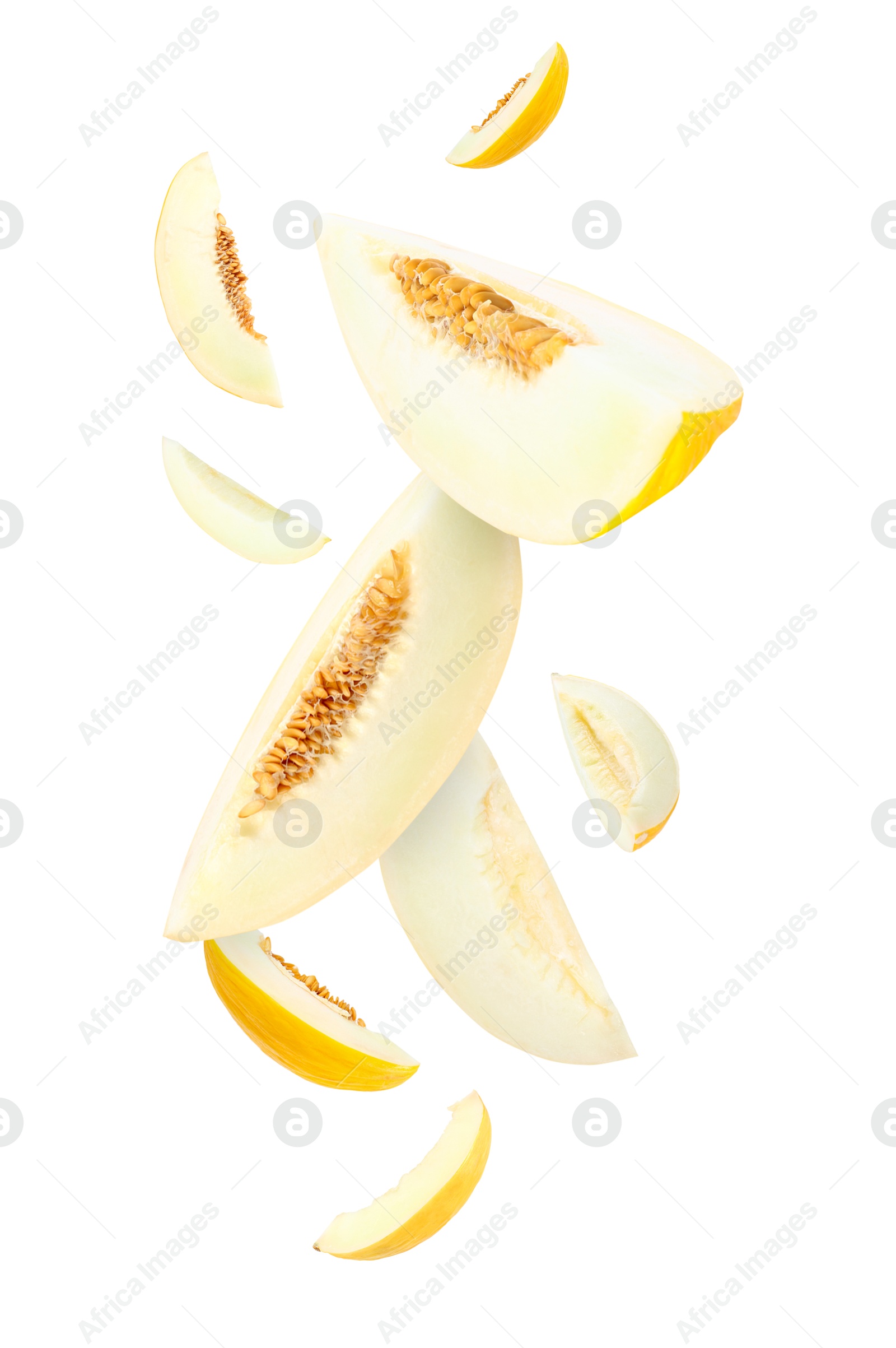 Cut fresh ripe melons swirling in air against white background Image of Cut fresh ripe melons swirling in air against white background