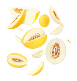 Image of Tasty ripe melons swirling in air against white background