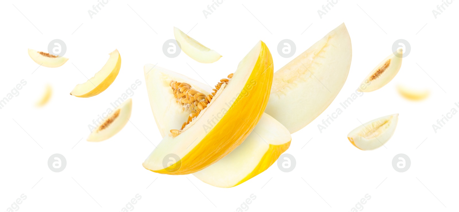 Cut fresh ripe melons swirling in air against white background Image of Cut fresh ripe melons swirling in air against white background
