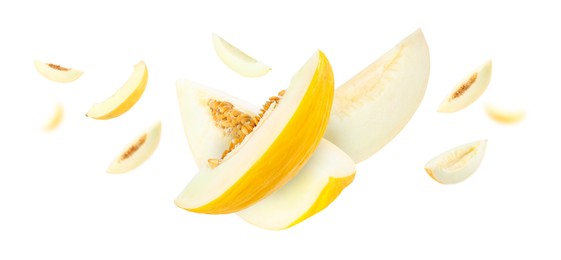 Image of Cut fresh ripe melons swirling in air against white background