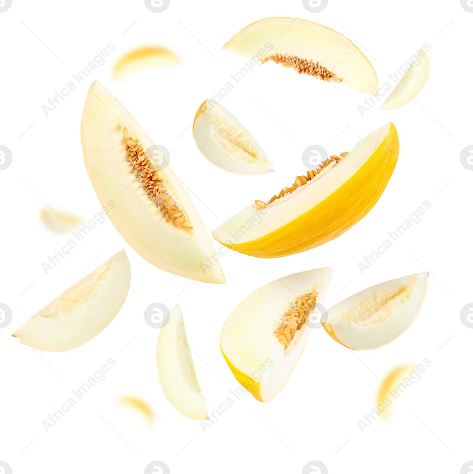 Cut fresh ripe melons swirling in air against white background Image of Cut fresh ripe melons swirling in air against white background