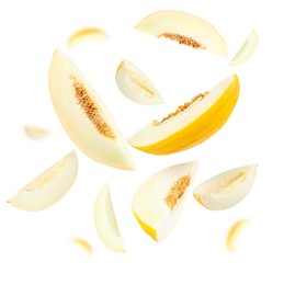 Image of Cut fresh ripe melons swirling in air against white background
