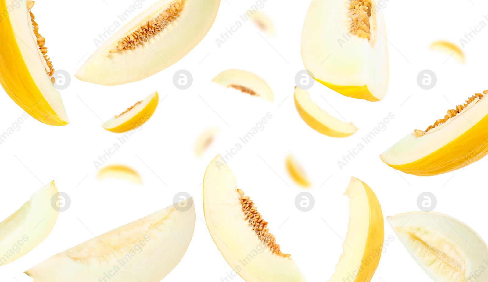 Cut fresh ripe melons swirling in air against white background Image of Cut fresh ripe melons swirling in air against white background