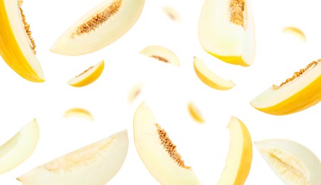 Image of Cut fresh ripe melons swirling in air against white background