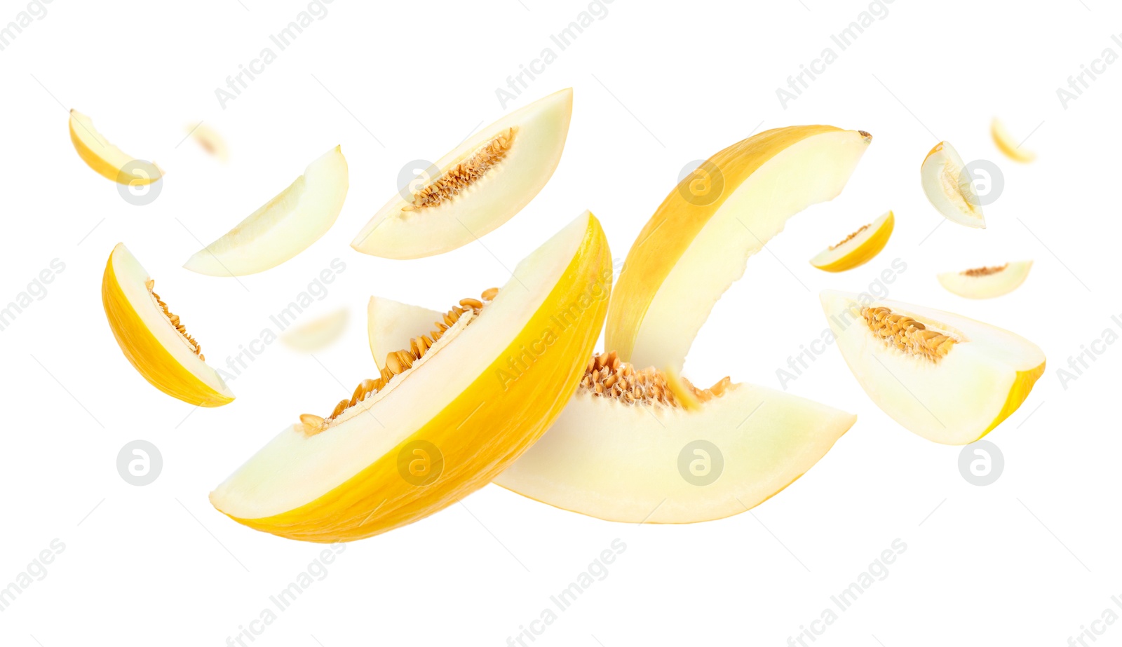 Cut fresh ripe melons swirling in air against white background Image of Cut fresh ripe melons swirling in air against white background
