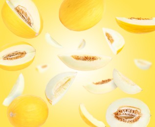 Image of Tasty ripe melons swirling in air against yellow gradient background