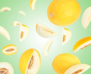 Image of Tasty ripe melons swirling in air against green gradient background