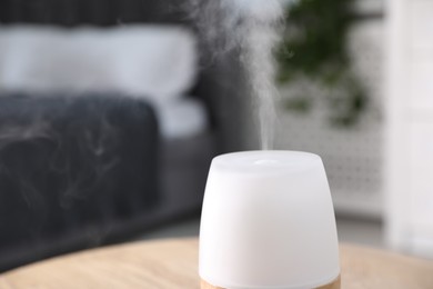 Photo of One stylish aroma lamp indoors, closeup. Space for text