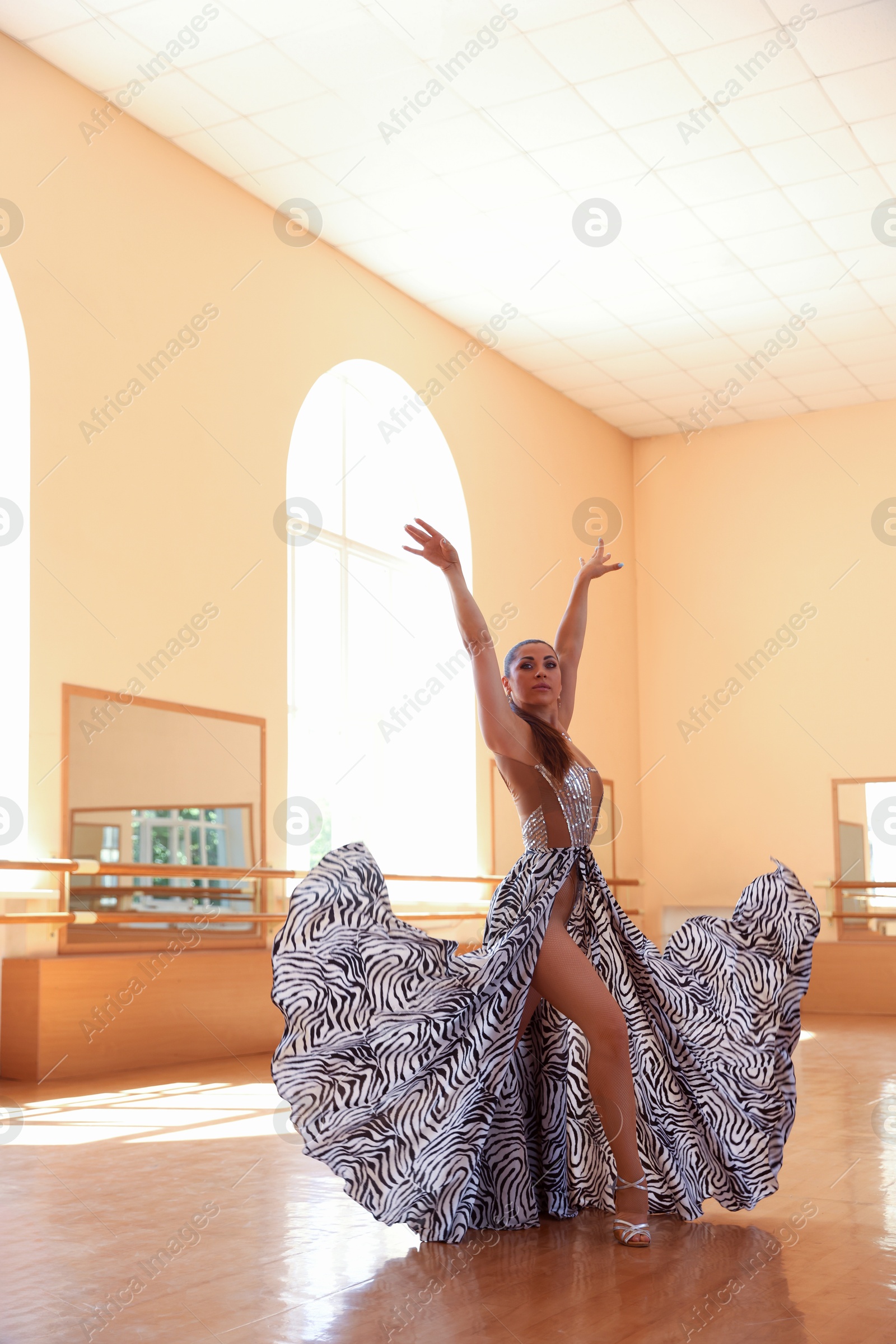 Professional dancer training choreography in dance studio Photo of Professional dancer training choreography in dance studio