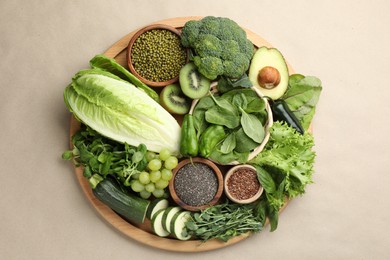 Photo of Superfood. Different healthy products on beige background, top view