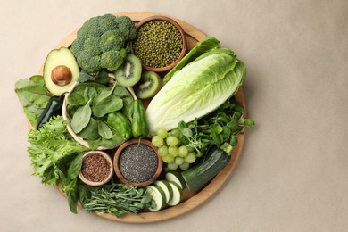 Photo of Superfood. Different healthy products on beige background, top view