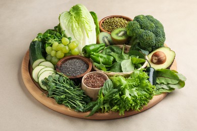 Photo of Superfood. Different healthy products on beige background, closeup