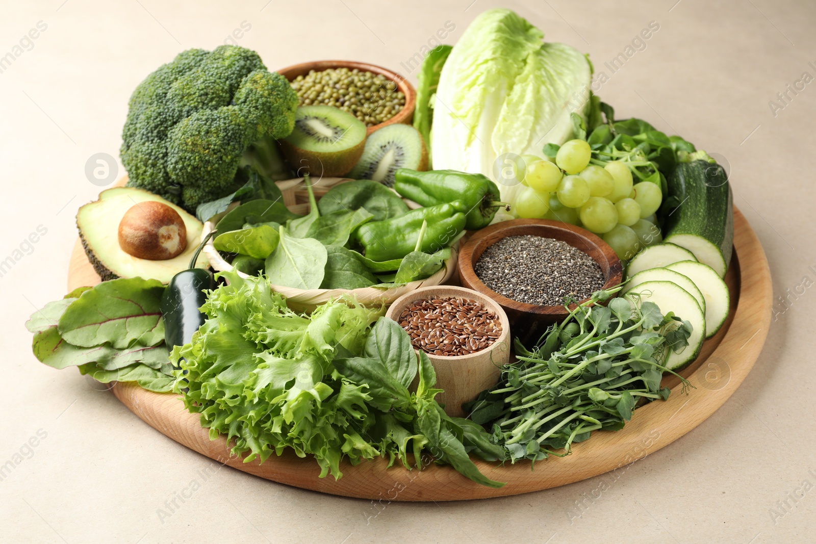 Superfood. Different healthy products on beige background, closeup Photo of Superfood. Different healthy products on beige background, closeup