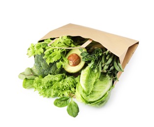 Photo of Superfood. Different healthy products in paper bag on white background