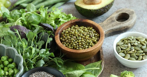 Photo of Superfood. Different healthy products on grey table, closeup