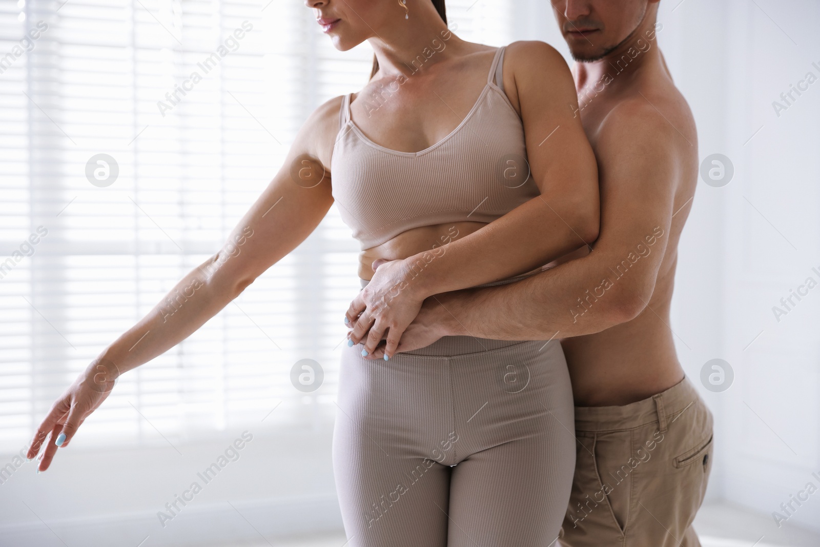 Couple of professional dancers training in studio, closeup Photo of Couple of professional dancers training in studio, closeup
