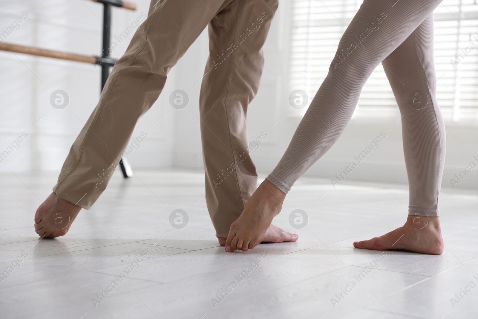 Couple of professional dancers training in studio, closeup Photo of Couple of professional dancers training in studio, closeup