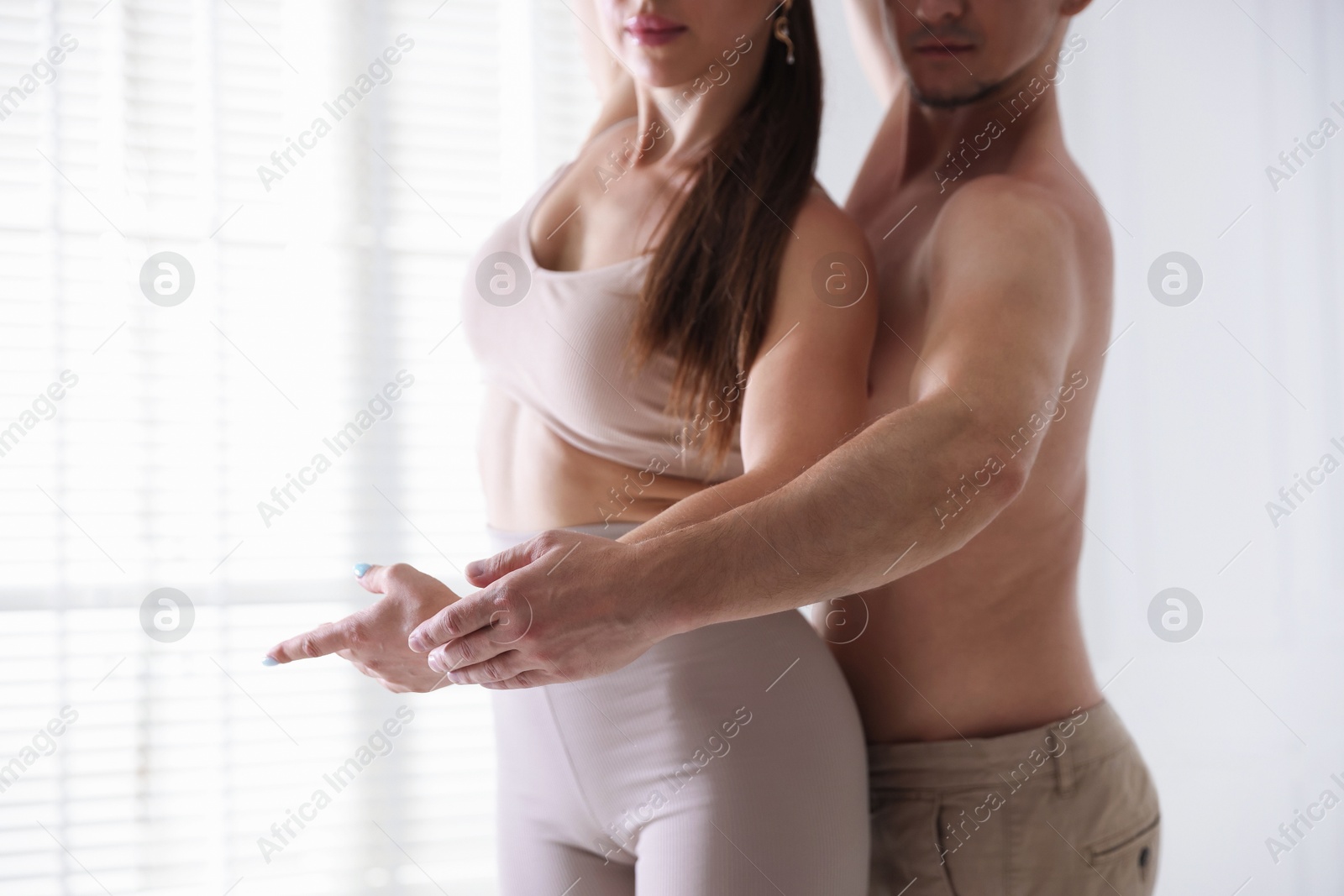 Couple of professional dancers training in studio, closeup Photo of Couple of professional dancers training in studio, closeup