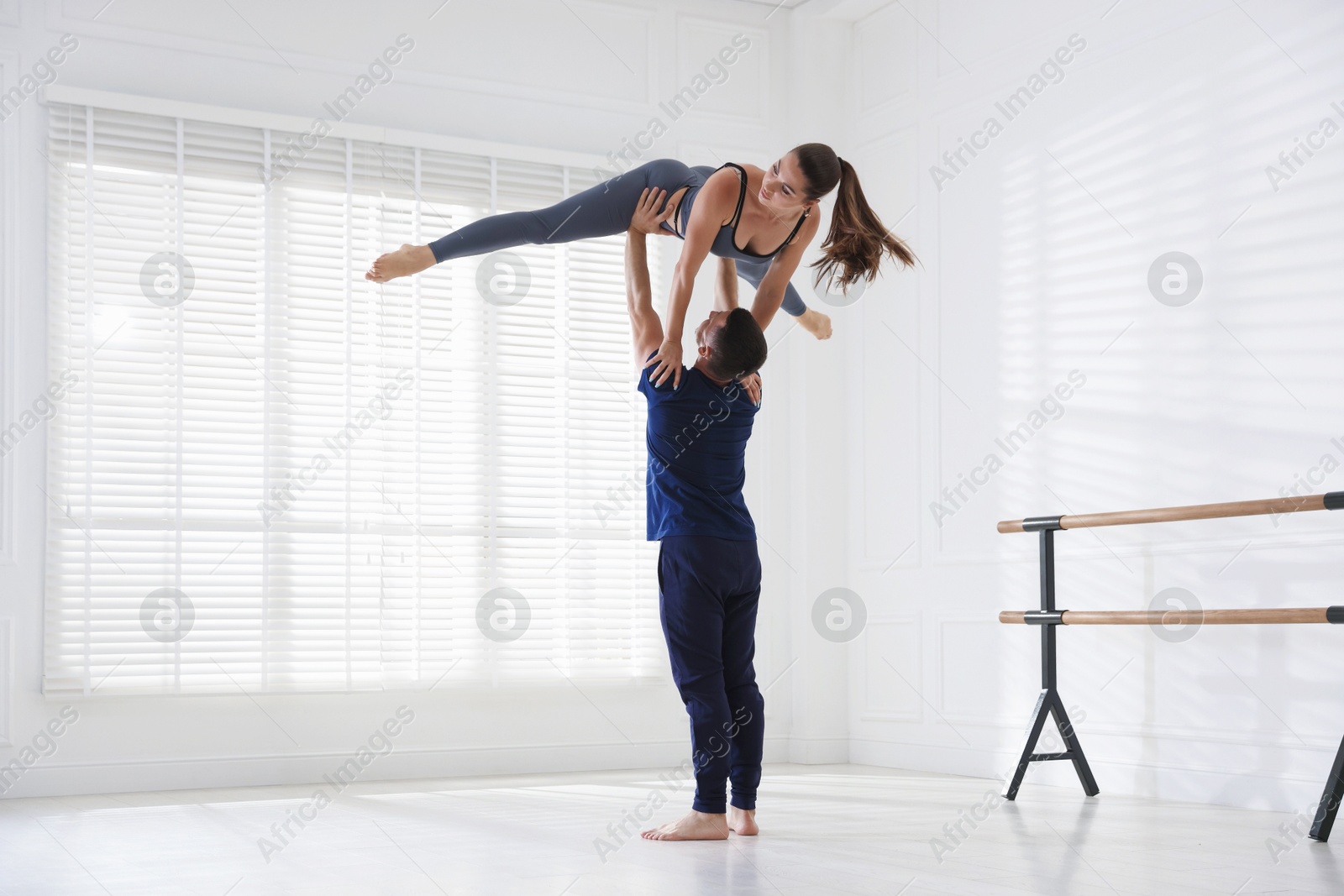 Couple of professional dancers training in studio Photo of Couple of professional dancers training in studio
