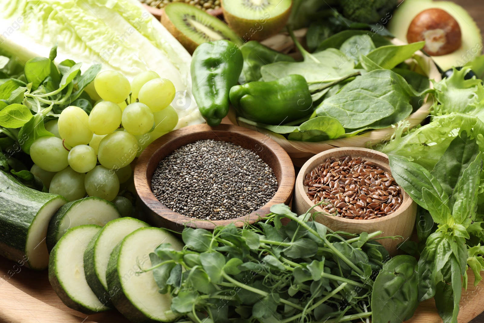 Superfood. Different healthy products on wooden table, closeup Photo of Superfood. Different healthy products on wooden table, closeup
