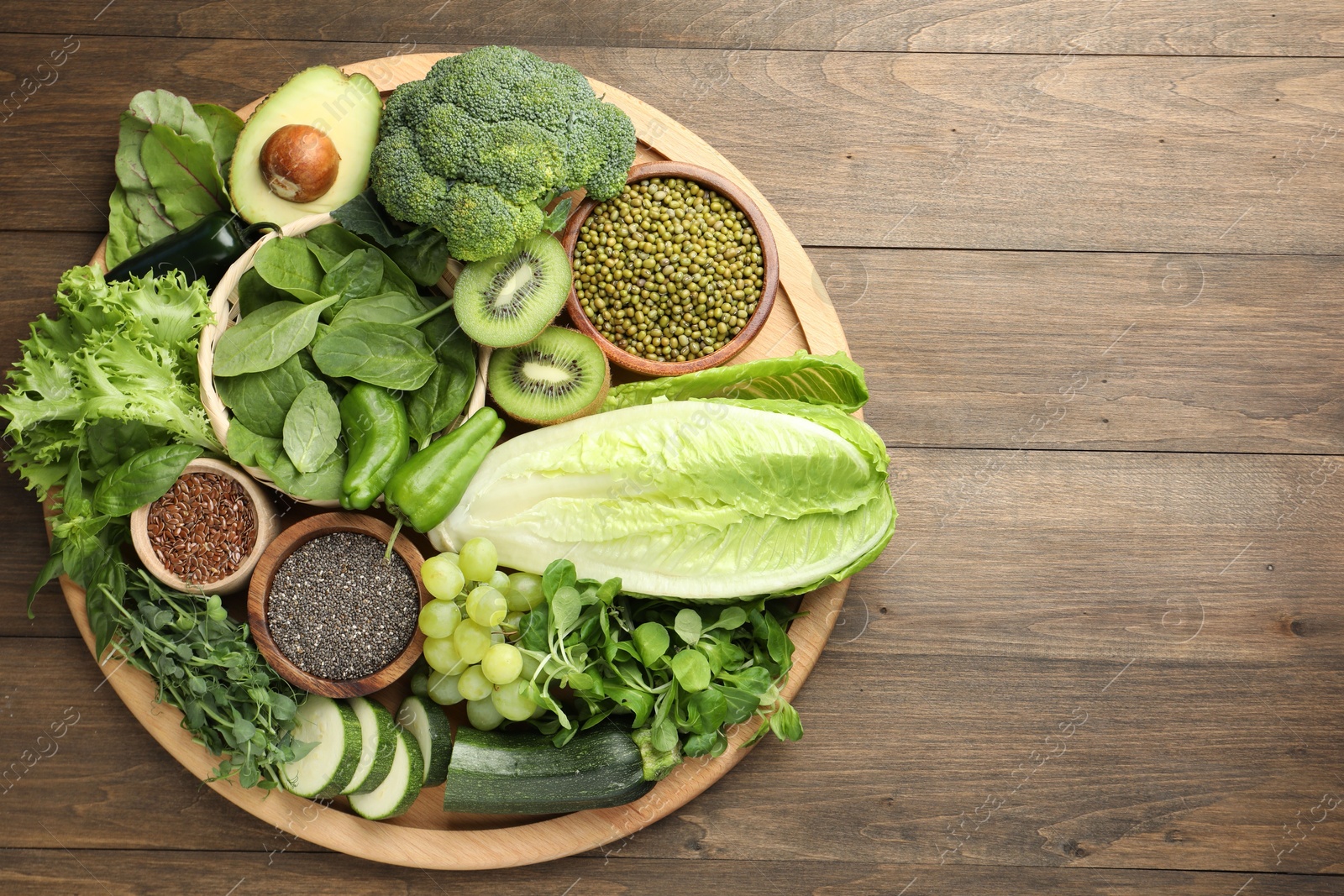 Photo of Superfood. Different healthy products on wooden table, top view. Space for text