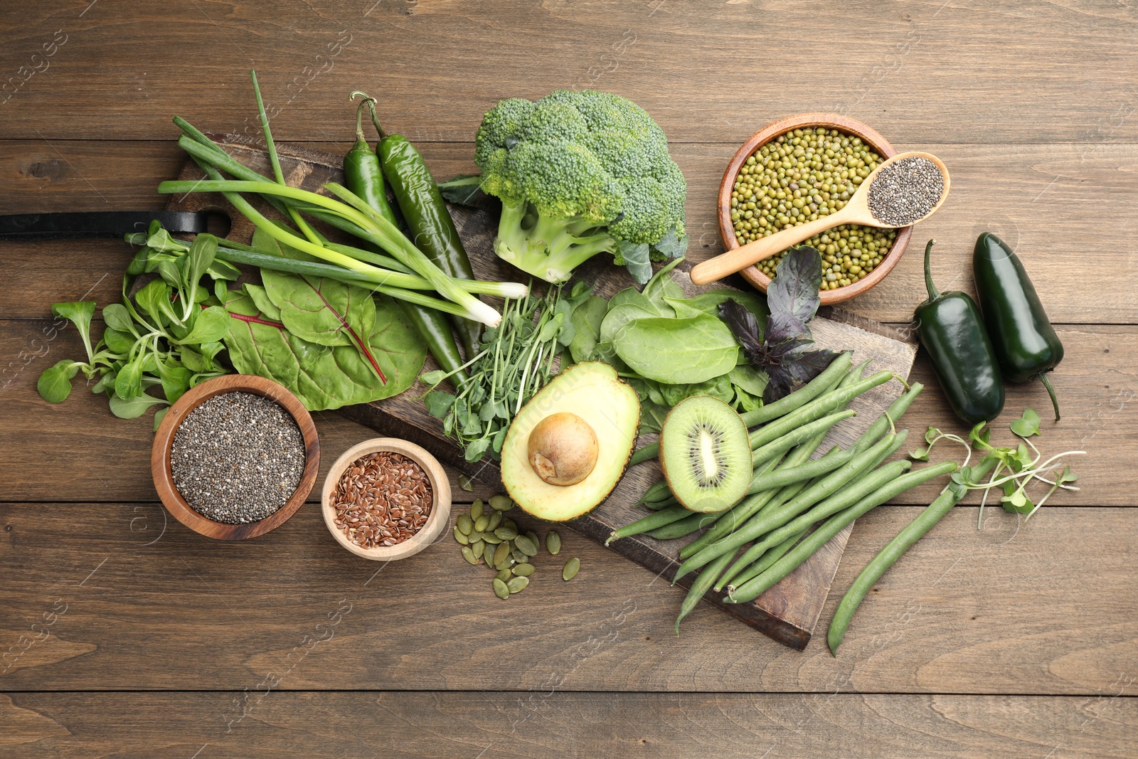 Superfood. Different healthy products on wooden table, flat lay Photo of Superfood. Different healthy products on wooden table, flat lay