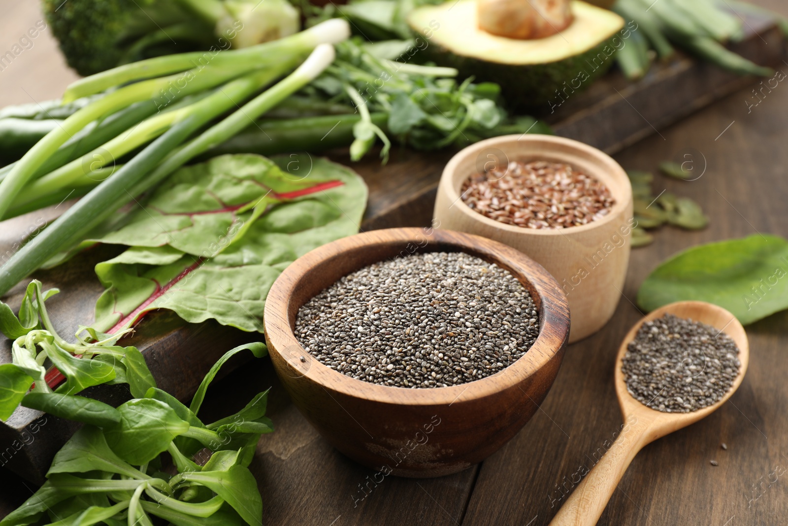 Superfood. Different healthy products on wooden table, closeup Photo of Superfood. Different healthy products on wooden table, closeup