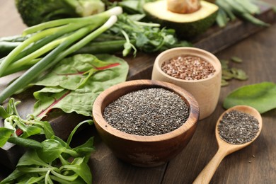 Photo of Superfood. Different healthy products on wooden table, closeup