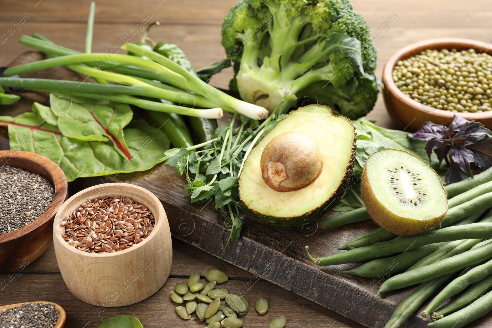 Superfood. Different healthy products on wooden table, closeup Photo of Superfood. Different healthy products on wooden table, closeup